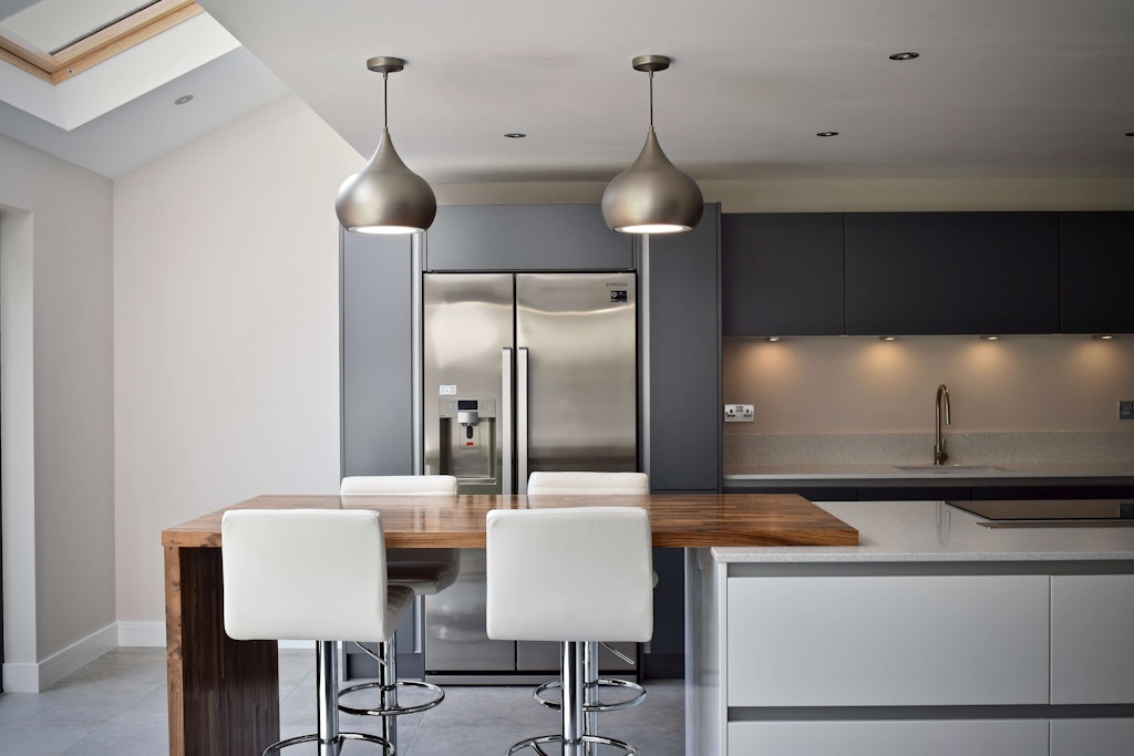 Classic interiors contemporary grey kitchen and island breakfast bar