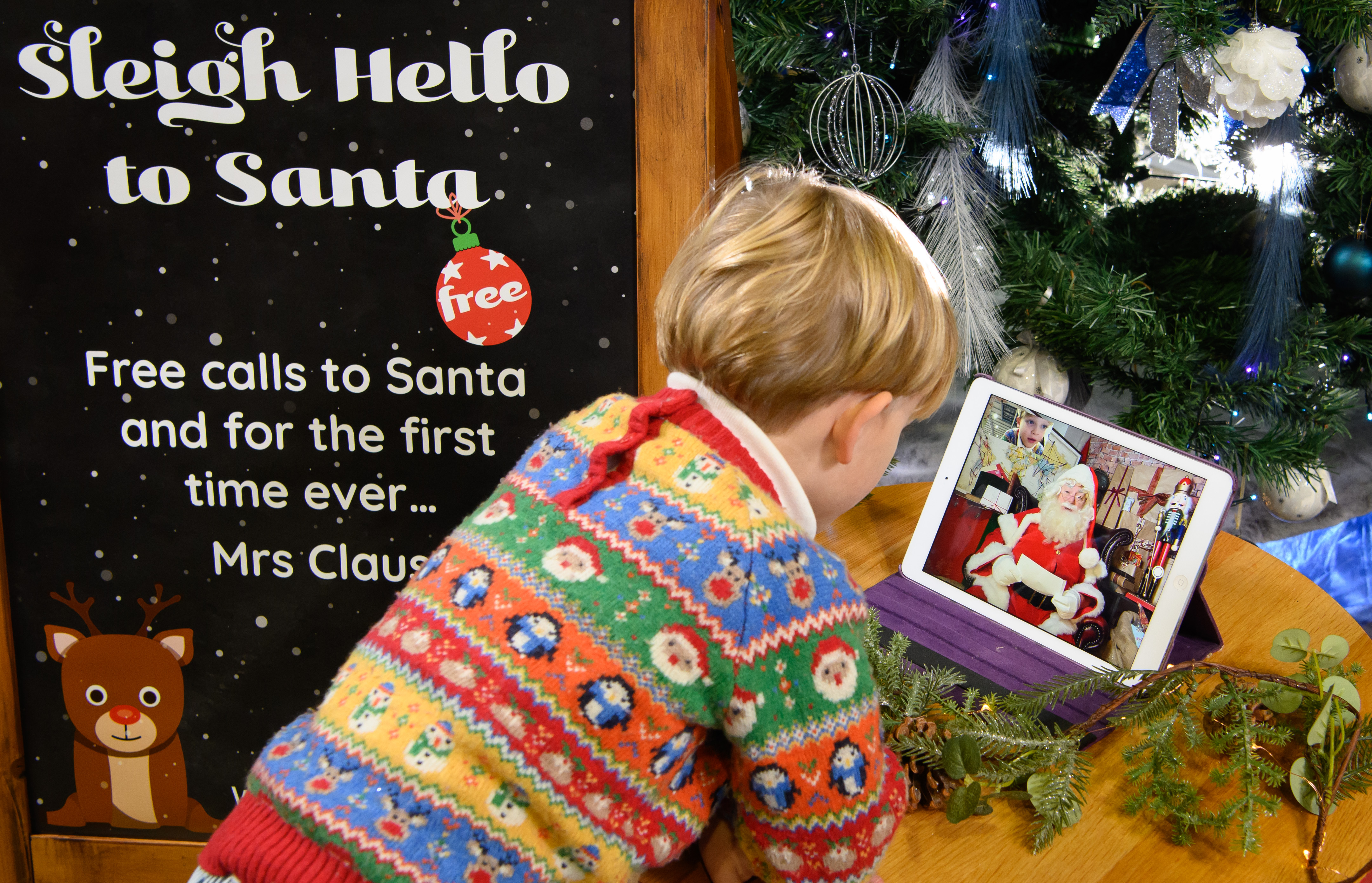 Child talking to Santa on FaceTime with Welcome Break